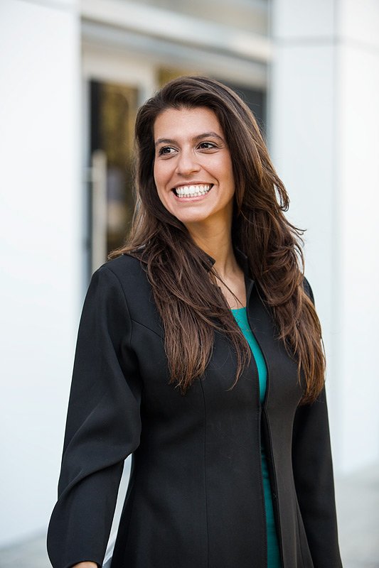 Natural Outdoor Portrait Female Smiling in Corporate Outfit